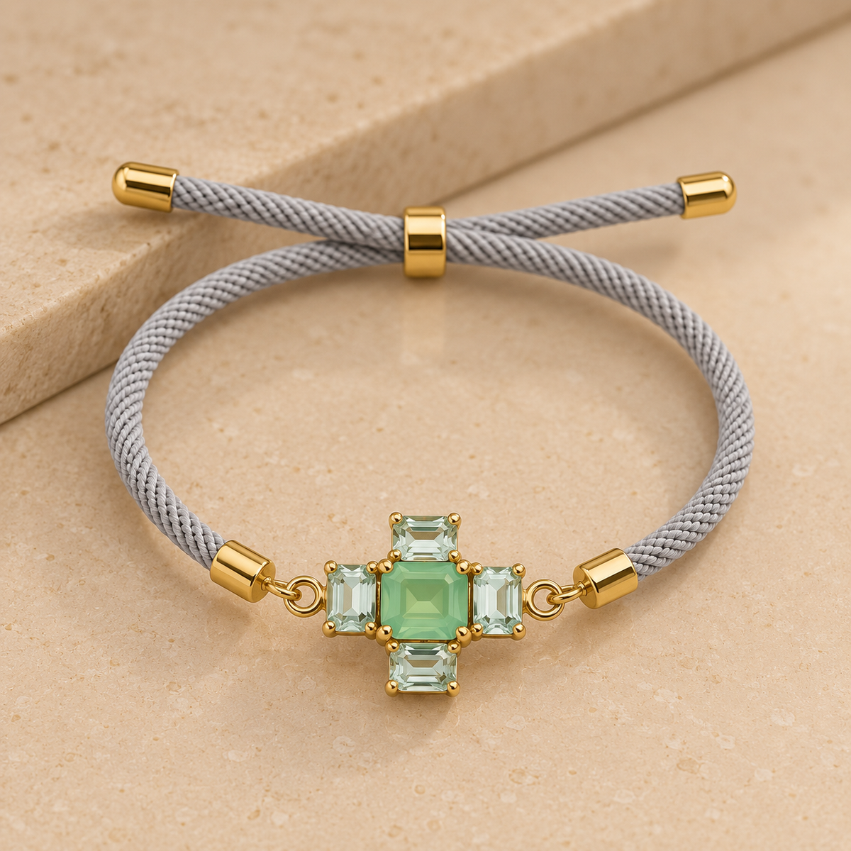 Pulsera Esenza de cuerda con cristal facetado y baño de oro